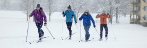 4 skiers in snowstorm