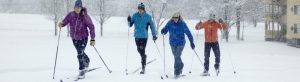 4 Skiers during snow storm
